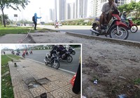 Đập bỏ vật nhọn nguy hiểm trên xa lộ Hà Nội