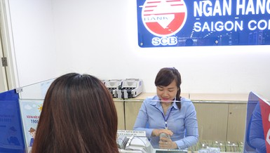 ‘Tỉ giá đang có lợi cho người giữ tiền Việt Nam’