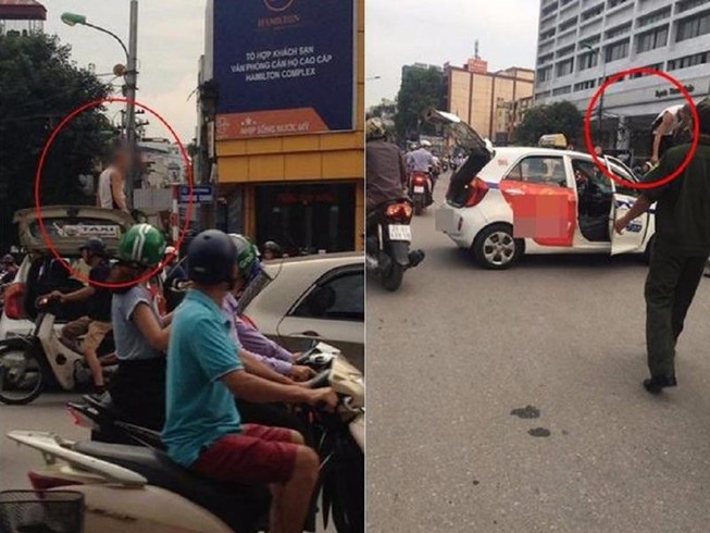 Bị dừng xe, tài xế taxi leo lên nóc 'ăn vạ'
