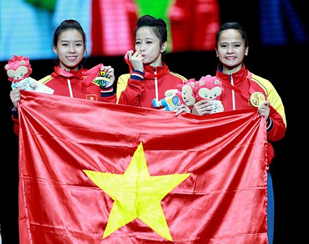 Chùm ảnh bộ 3 hotgirl Việt Nam giành HCV Taekwondo