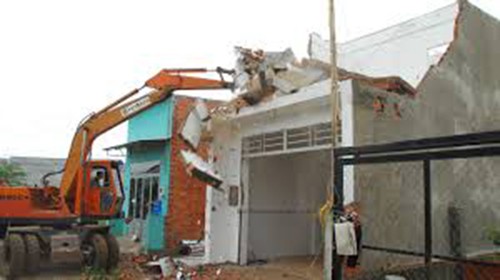 Nhà trái phép: Phải xử lý cả vi phạm về đất