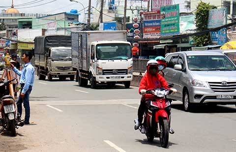 Nâng cao quốc lộ 13 cũ lên 2 m có phí tiền?
