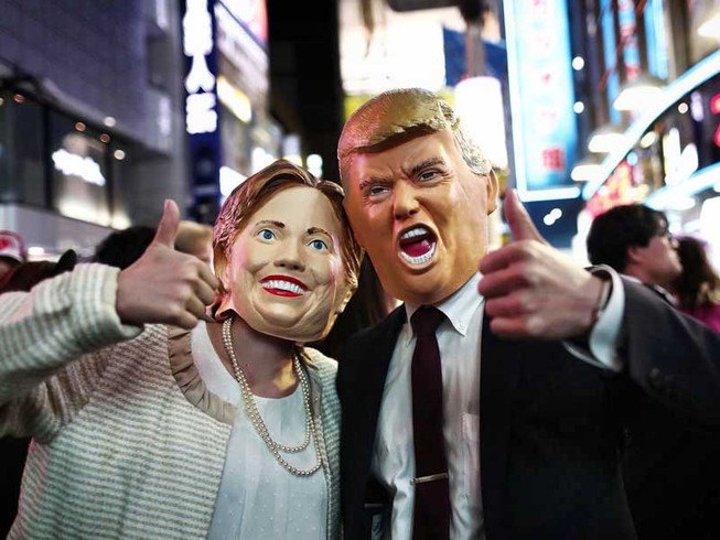 Bà Clinton giảm dần cách biệt với ông Trump