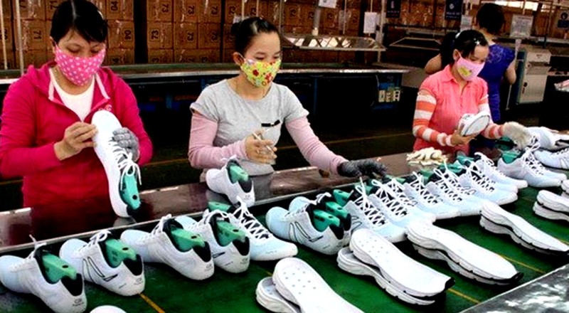 Khoảng 1 tỉ đôi giày được làm tại Việt Nam với giá 15 USD/đôi - ảnh 1