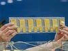 Giá vàng nội trượt dốc, thấp hơn vùng đỉnh gần 35 triệu đồng/lượng