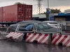 Cầu vượt Tân Thới Hiệp ùn tắc vì va chạm giữa container và ô tô