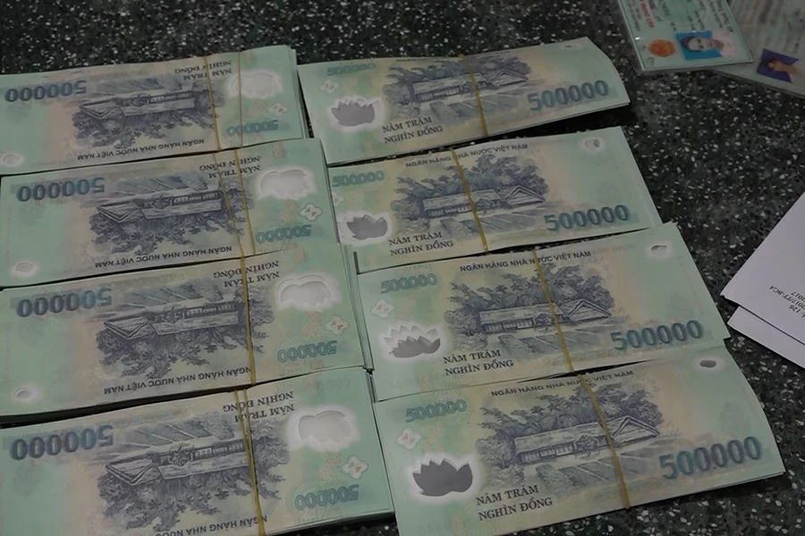 Bắt đường dây sản xuất tiêu thụ tiền giả, thu lựu đạn, hung khí Báo