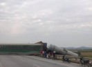 Tàu hỏa văng nhiều toa, đường sắt và quốc lộ 1A tê liệt