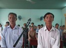 8 luật sư bào chữa miễn phí cho 2 nông dân nhận hối lộ