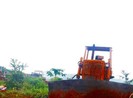 Tài xế máy ủi đâm chết người ngăn cản