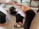 3 nữ sinh đánh, xé áo dài bạn học trong lớp