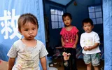 Những đứa trẻ trong động đất ở Vân Nam ảnh 4