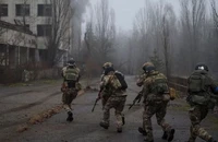 Quân Ukraine trong một cuộc tập trận hồi 20-1 tại Nhà máy điện hạt nhân Chernobyl,TP Pripyat (Ukraine). Ảnh: REUTERS