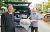 Bắt được trăn hàng chục kg ở ven rạch Nước Lên