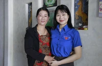 Chị Thanh Hằng tự nguyện viết đơn tham gia nghĩa vụ quân sự. Ảnh: TN