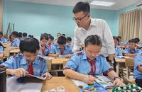 Học sinh Trường THCS Lý Tự Trọng (quận Gò Vấp, TP.HCM) trong một tiết học. Ảnh: NGUYỄN QUYÊN