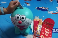 Năm nay, con tôi đã biết đòi giữ tiền lì xì Tết