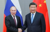 Tổng thống Nga Vladimir Putin (trái) và Chủ tịch Trung Quốc Tập Cận Bình (phải). Ảnh: XINHUA