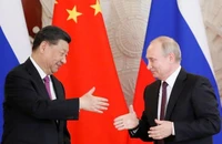 Chủ tịch Trung Quốc Tập Cận Bình (trái) và Tổng thống Nga Vladimir Putin. Ảnh: REUTERS