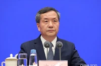 Giám đốc Trung tâm Kiểm soát và Phòng ngừa dịch bệnh Trung Quốc (CDC) - ông Thẩm Hồng Băng trong cuộc họp báo hôm 8-4. Ảnh: Xu Xiang/China SCIO