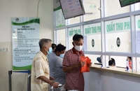 Con nuôi của sĩ quan quân đội trên 18 tuổi có được cấp thẻ BHYT?