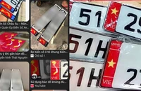 In Quốc kỳ, bản đồ lên biển số xe có vi phạm pháp luật?