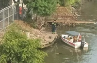 Thi thể một phụ nữ không mặc áo trôi trên sông Đồng Nai