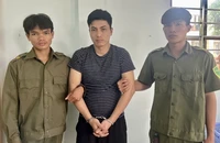 Bắt giữ nghi can chém cha mẹ vợ cũ ngay trong phòng ngủ