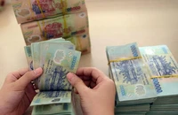 Ngân hàng vẫn 'thừa tiền' dù đã giảm mạnh lãi vay