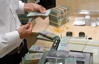 Yêu cầu giảm thêm 2% lãi suất với cả khoản vay cũ và mới 