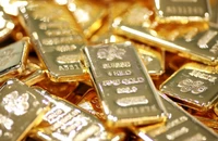 Nhờ đâu giá vàng thế giới tăng gần 100 USD?