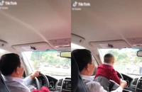 Hiểm họa rình rập khi vừa lái xe ô tô vừa ôm trẻ