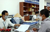 Giảm cán bộ không chuyên trách: Tăng áp lực, lo quá tải