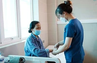 Bệnh nhân cúm A điều trị tại BV Thanh Nhàn (Hà Nội).