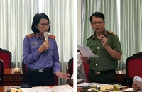 Bà Lê Thị Đông, đại diện VKSND TP.HCM (trái) và ông Nguyễn Văn Chung, đến từ Trường ĐH An ninh nhân dân (phải), phát biểu tại hội thảo.