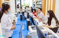 Thí sinh làm thủ tục nhập học vào trường đại học tại TP.HCM.
