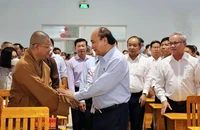 Chủ tịch nước Nguyễn Xuân Phúc tiếp xúc với cử tri huyện Hóc Môn, TP.HCM vào chiều 12-10.