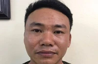 Nguyễn Mạnh Quân tại cơ quan điều tra. Ảnh: CACC