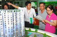 Bỏ đề xuất đánh thuế sang tên sổ đỏ: Dân mừng