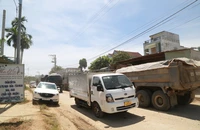 Quốc lộ 14E nắng bụi, mưa lầy, người dân than khổ