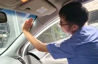 Đề xuất không dán tem kiểm định trên kính ô tô