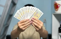 Người dân không nên tin vào các quảng cáo đổi tiền lẻ, tiền mới trên các trang mạng xã hội. Ảnh: HUỲNH THƠ
