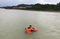 Người phụ nữ trôi trên sông Lam nói 'để chị chết' khi cảnh sát tiếp cận 