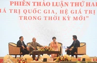 Các đại biểu thảo luận tại hội thảo. Ảnh: VIẾT THỊNH