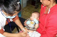Trẻ ở TP.HCM đang tiêm vaccine trong chương trình tiêm chủng mở rộng. Ảnh: TRẦN NGỌC