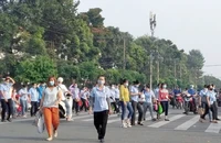 Khoản tiền thưởng Tết mà người lao động được nhận phải chịu thuế TNCN. Ảnh: PHONG ĐIỀN