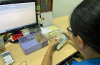 Thưởng Tết cho người lao động sẽ do người sử dụng lao động quyết định. Ảnh: TRẦN MINH