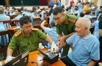 Công an TP.HCM cấp thẻ căn cước cho những người yếu thế tại Trung tâm Bảo trợ người tàn tật Hiệp Bình Chánh. Ảnh: HT