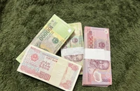 Tiền mới khan hiếm, đổi tiền mệnh giá nhỏ khó khăn