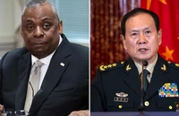 Bộ trưởng Quốc phòng Mỹ Lloyd Austin (trái) và người đồng cấp Trung Quốc Ngụy Phượng Hòa. Ảnh: AFP